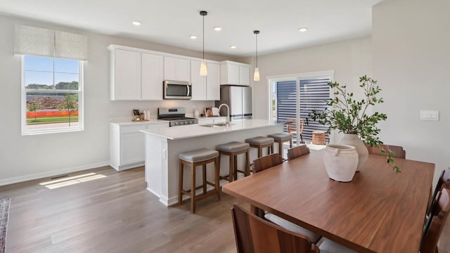 505 Oak Opening Dr, Stoughton, WI 53589 - dining area featuring light wood finished floors and recessed lighting