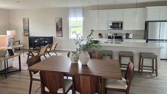 505 Oak Opening Dr, Stoughton, WI 53589 - dining room with wood finished floors and baseboards