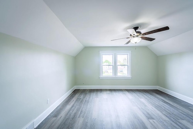 3834 Sheridan Rd, Kenosha, WI 53140 - bonus room with vaulted ceiling, a ceiling fan, wood finished floors, and baseboards