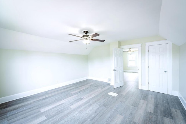 3834 Sheridan Rd, Kenosha, WI 53140 - bonus room featuring a ceiling fan, lofted ceiling, baseboards, and wood finished floors