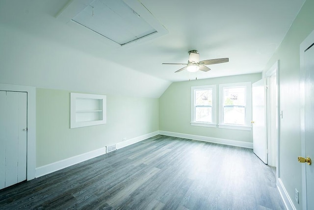 3834 Sheridan Rd, Kenosha, WI 53140 - additional living space featuring ceiling fan, wood finished floors, baseboards, lofted ceiling, and attic access