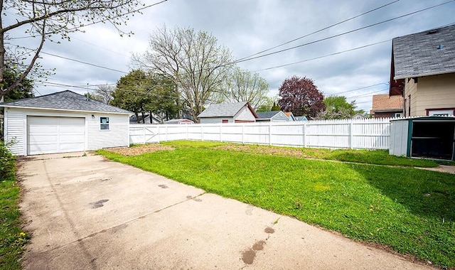 3834 Sheridan Rd, Kenosha, WI 53140 - view of yard with an outbuilding, concrete driveway, and a detached garage