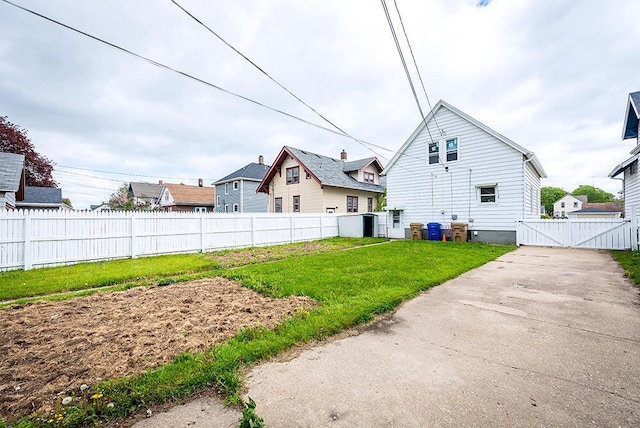 3834 Sheridan Rd, Kenosha, WI 53140 - rear view of house featuring a gate