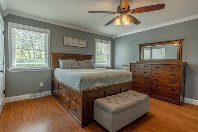 220 Grove St, Ridgeway, WI 53582 - bedroom featuring wood finished floors, baseboards, crown molding, and ceiling fan