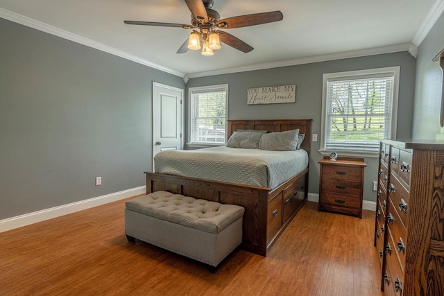 220 Grove St, Ridgeway, WI 53582 - bedroom with wood finished floors, baseboards, ornamental molding, and ceiling fan
