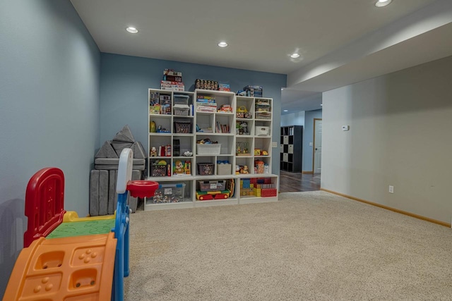 220 Grove St, Ridgeway, WI 53582 - rec room with carpet floors, baseboards, and recessed lighting