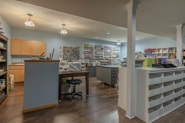 220 Grove St, Ridgeway, WI 53582 - home office with decorative columns, dark wood-type flooring, recessed lighting, a sink, and a chandelier