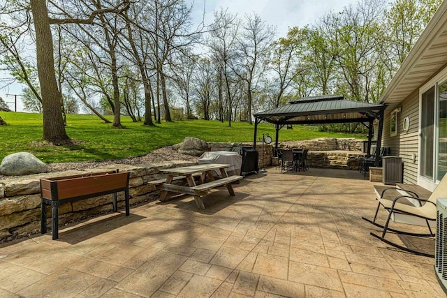 220 Grove St, Ridgeway, WI 53582 - view of patio featuring a gazebo and central AC