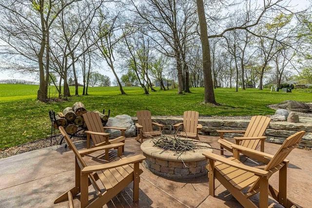 220 Grove St, Ridgeway, WI 53582 - view of patio / terrace with an outdoor fire pit