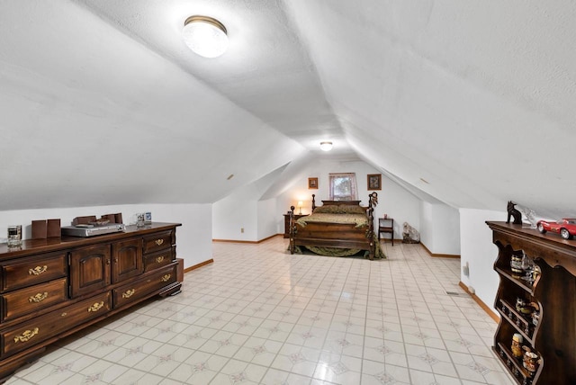 2901 W Forest Hill Ave, Franklin, WI 53132 - bedroom featuring lofted ceiling and baseboards