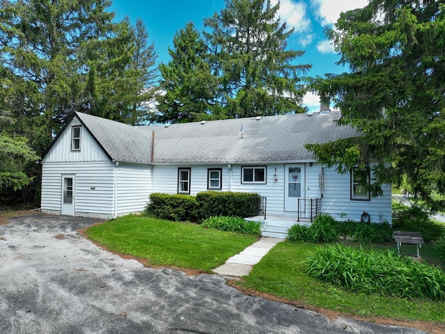 2901 W Forest Hill Ave, Franklin, WI 53132 - view of front of property with a front lawn and a shingled roof