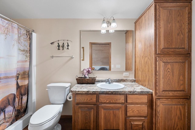 W6554 Wolf Lake Rd, Wausaukee, WI 54177 - bathroom featuring vanity, toilet, and curtained shower
