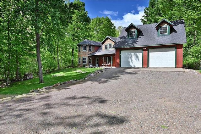 2706 28 1/8 St, Birchwood, WI 54817 - view of front of property with a front lawn, driveway, and a garage