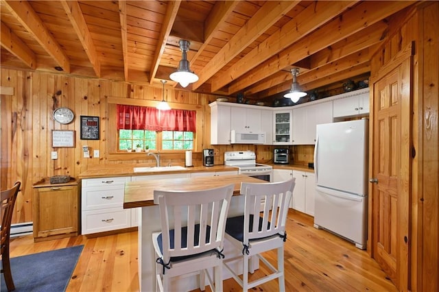 2706 28 1/8 St, Birchwood, WI 54817 - kitchen with white appliances, a sink, wooden ceiling with exposed beams, light wood-style flooring, and white cabinetry