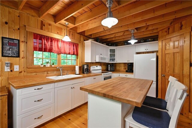 2706 28 1/8 St, Birchwood, WI 54817 - kitchen with white appliances, a sink, wood counters, white cabinets, and wood ceiling with exposed beams