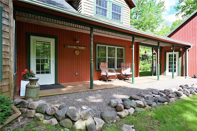 2706 28 1/8 St, Birchwood, WI 54817 - view of exterior entry featuring covered porch and a shingled roof