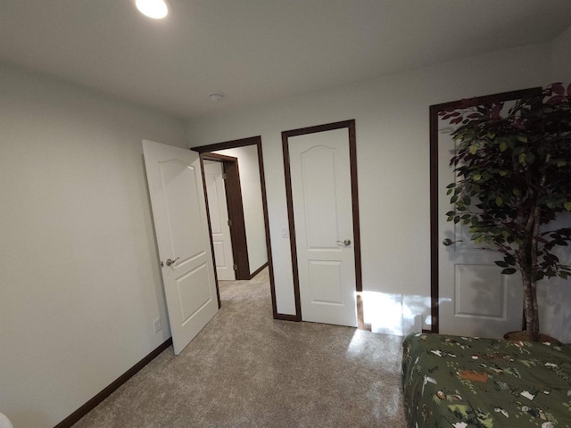37375 E Bresette Hill Rd, Bayfield, WI 54814 - unfurnished bedroom featuring light carpet and baseboards