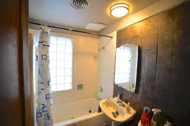 2435 N 44th St Unit 2437, Milwaukee, WI 53210 - full bathroom with shower / bath combination with curtain and a sink
