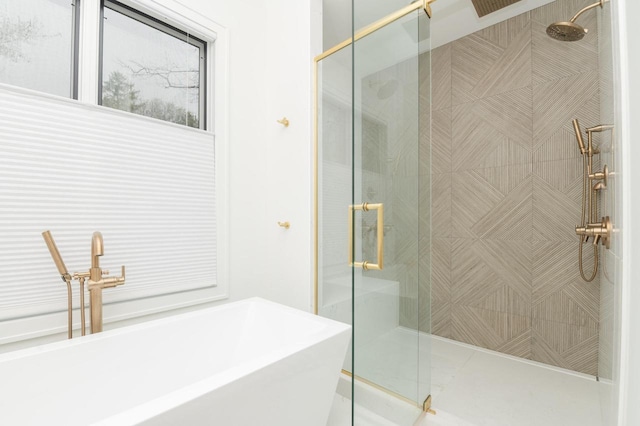 W329N6597 Forest Dr, Hartland, WI 53029 - bathroom with a freestanding tub, a stall shower, and a sink
