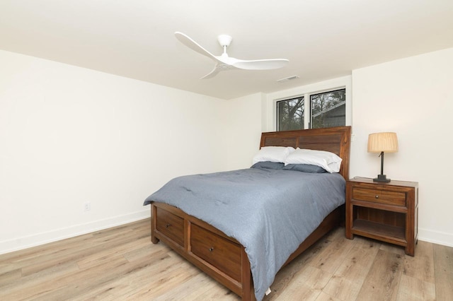 W329N6597 Forest Dr, Hartland, WI 53029 - bedroom featuring light wood-type flooring, baseboards, and a ceiling fan