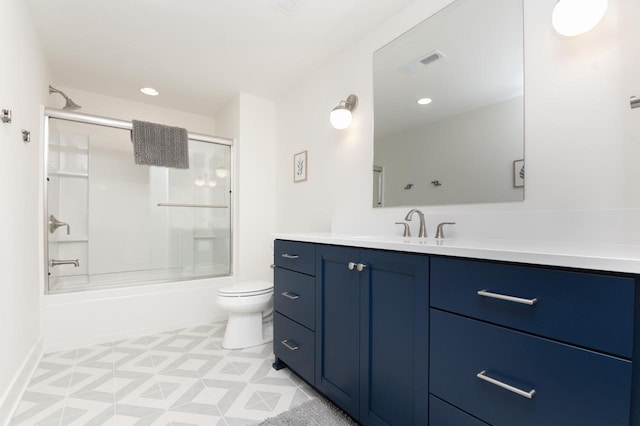 W329N6597 Forest Dr, Hartland, WI 53029 - full bathroom featuring vanity, toilet, shower / bath combination with glass door, and recessed lighting