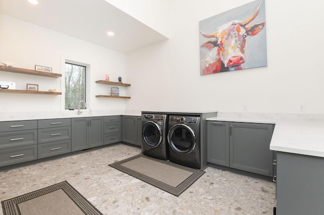W329N6597 Forest Dr, Hartland, WI 53029 - laundry room featuring cabinet space, separate washer and dryer, and recessed lighting