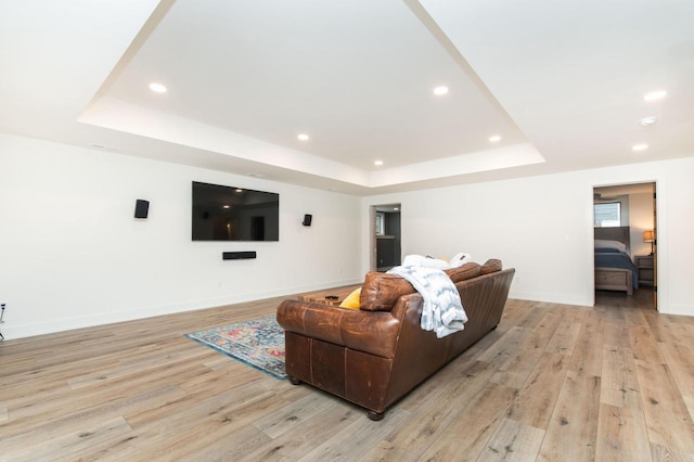 W329N6597 Forest Dr, Hartland, WI 53029 - living room with a raised ceiling, light wood finished floors, recessed lighting, and baseboards