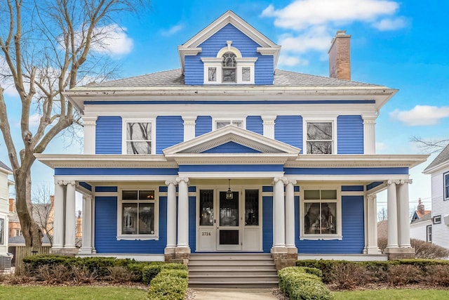 2724 N Shepard Ave, Milwaukee, WI 53211 - view of front of home featuring a porch and a chimney
