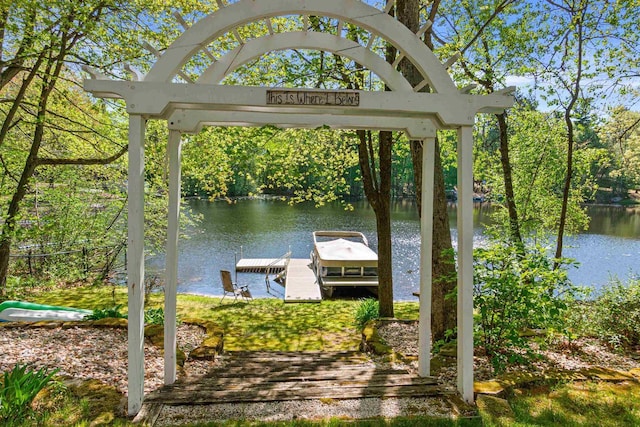 N1124 County Rd E, Waupaca, WI 54981 - dock area featuring a water view