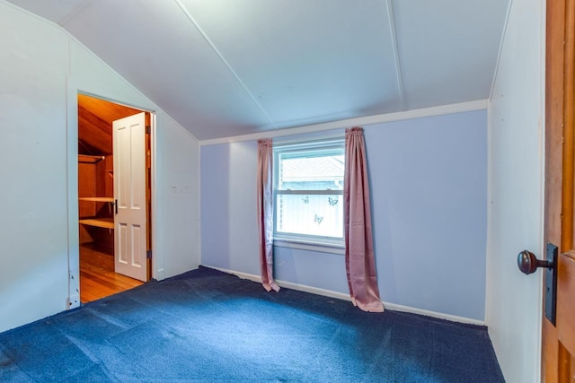 3218 Aalseth Ln, Stoughton, WI 53589 - bonus room with vaulted ceiling, carpet flooring, and baseboards