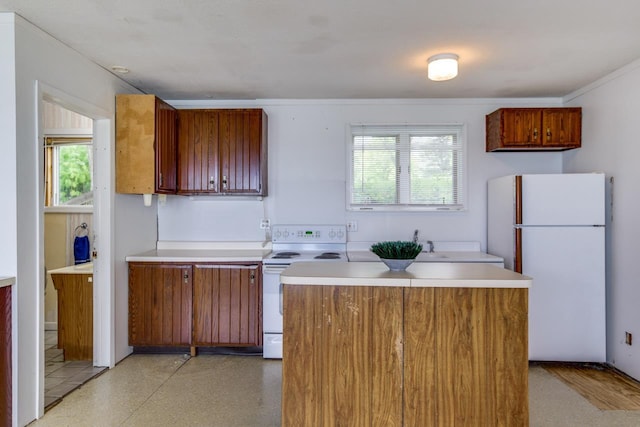 3218 Aalseth Ln, Stoughton, WI 53589 - kitchen featuring white appliances, healthy amount of natural light, and light countertops