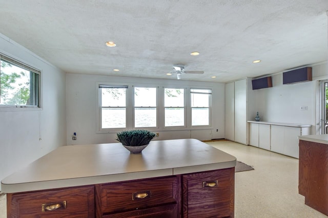 3218 Aalseth Ln, Stoughton, WI 53589 - kitchen featuring healthy amount of natural light, light countertops, a ceiling fan, and recessed lighting