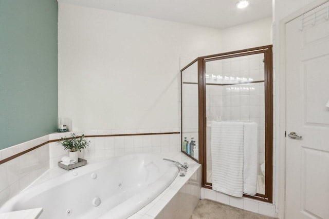 14048 W Waters Edge Trl, New Berlin, WI 53151 - bathroom featuring a stall shower and a jetted tub