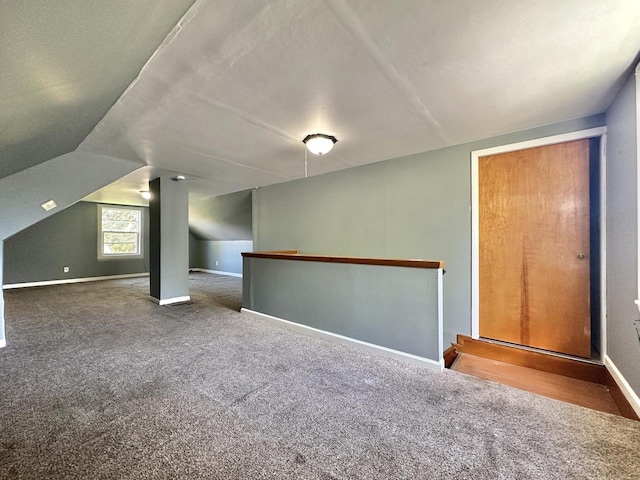 5936 N 35th St, Milwaukee, WI 53209 - additional living space with vaulted ceiling, carpet floors, and baseboards