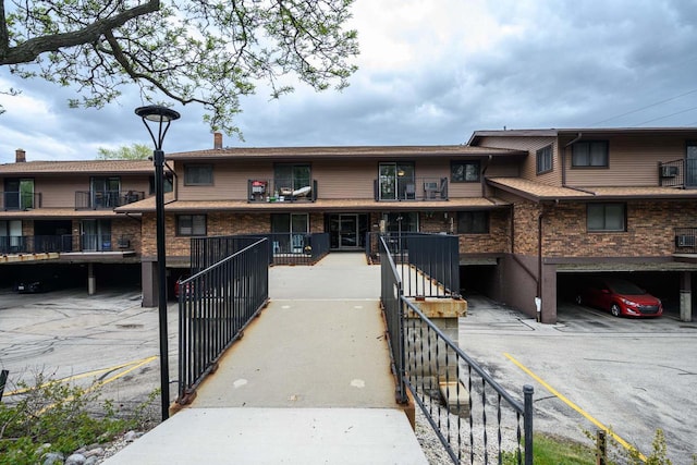 8525 W Waterford Ave Unit 1, Greenfield, WI 53228 - view of building exterior with covered parking