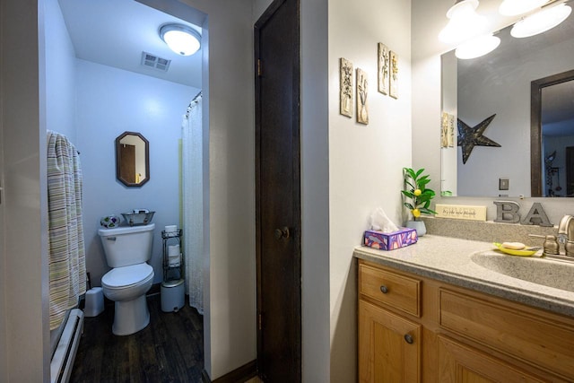 8525 W Waterford Ave Unit 1, Greenfield, WI 53228 - full bath featuring wood finished floors, toilet, vanity, a baseboard heating unit, and a shower with shower curtain