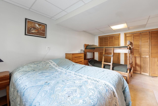 10029 W Spring Rd, Fox Lake, WI 53933 - tiled bedroom with a drop ceiling
