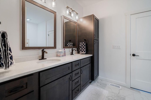 W4936 Battlestone Station Rd, La Crosse, WI 54601 - full bath with marble look tiles and double vanity
