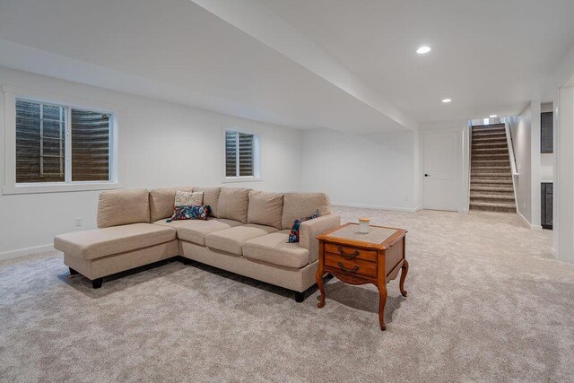 W4936 Battlestone Station Rd, La Crosse, WI 54601 - carpeted living area featuring baseboards, stairs, and recessed lighting