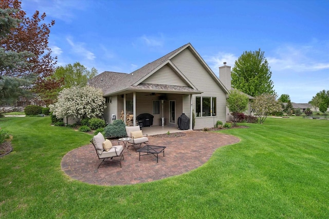 4021 Three Penny Ct, De Pere, WI 54115 - rear view of property featuring a patio area, a ceiling fan, a yard, and a shingled roof
