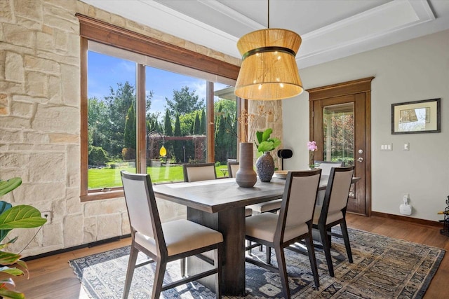4021 Three Penny Ct, De Pere, WI 54115 - dining room with wood finished floors, baseboards, crown molding, and a raised ceiling