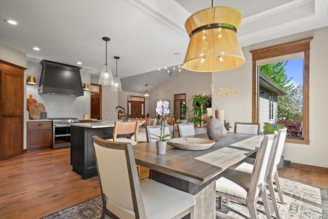 4021 Three Penny Ct, De Pere, WI 54115 - dining space featuring wood finished floors, recessed lighting, baseboards, and a chandelier