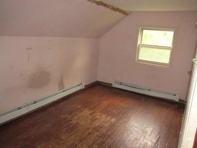 N4078 County Road A, Oxford, WI 53952 - bonus room featuring a baseboard radiator, lofted ceiling, wood finished floors, and baseboard heating