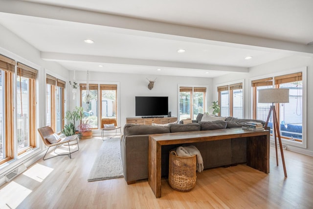 4781 N Idlewild Ave, Whitefish Bay, WI 53211 - living area with beamed ceiling, plenty of natural light, light wood-type flooring, and recessed lighting