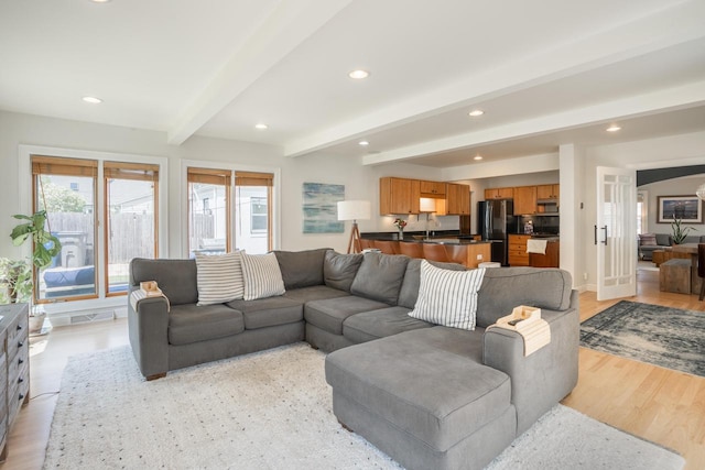 4781 N Idlewild Ave, Whitefish Bay, WI 53211 - living area with recessed lighting, beamed ceiling, and light wood-style floors