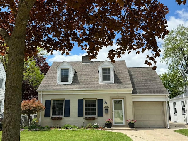 4781 N Idlewild Ave, Whitefish Bay, WI 53211 - new england style home with an attached garage, roof with shingles, driveway, and a chimney