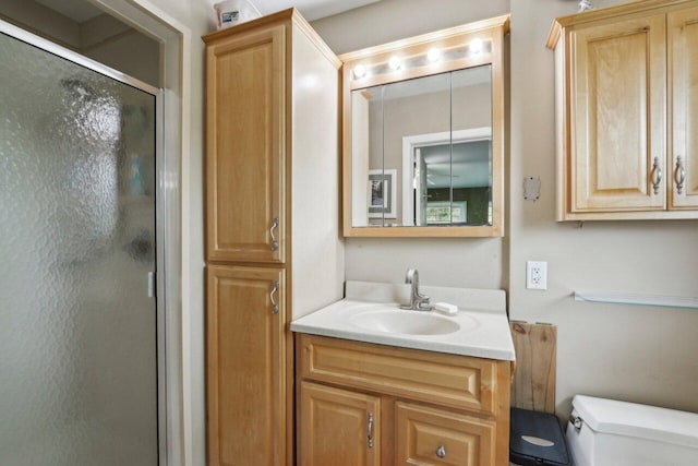 620 S Greenfield Ave, Waukesha, WI 53186 - bathroom with toilet, a stall shower, and vanity