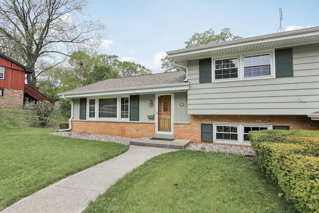 620 S Greenfield Ave, Waukesha, WI 53186 - split level home with a front lawn and brick siding