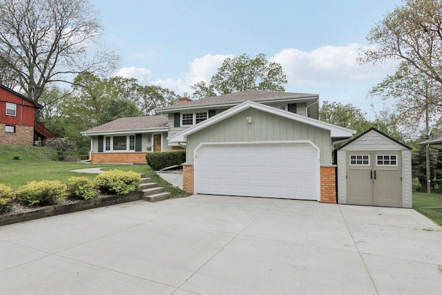 620 S Greenfield Ave, Waukesha, WI 53186 - split level home featuring brick siding, a front lawn, board and batten siding, a chimney, and a garage