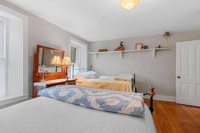 4105 Lime Kiln Rd, Green Bay, WI 54311 - bedroom featuring wood finished floors and baseboards